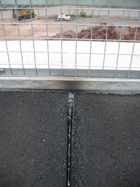 Poor control with cutting joints damaging permanent mesh on a parapet rail