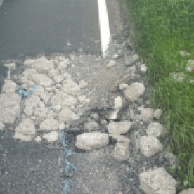 Pothole - Plated manhole surfaced over